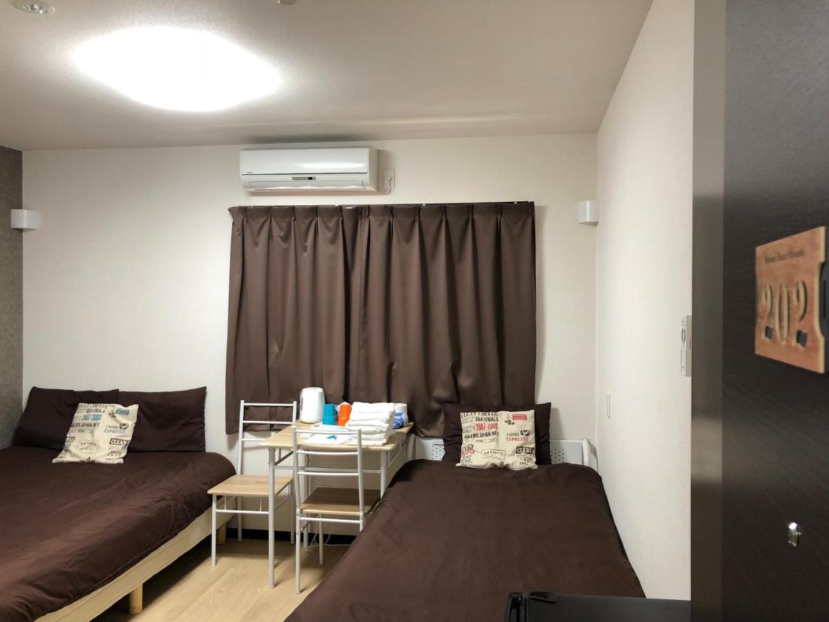 Keimei Guest House Осака Екстериор снимка